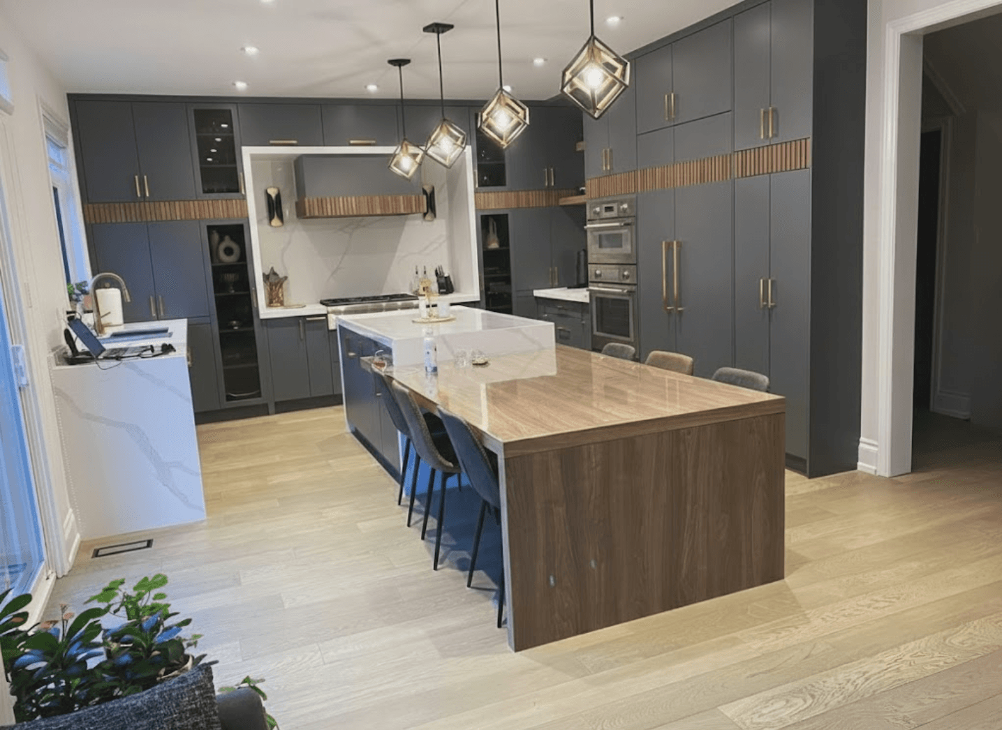 Modern kitchen with dark cabinets after renovation