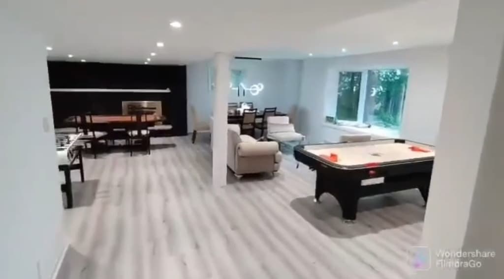 Completed entertainment games room with modern furniture