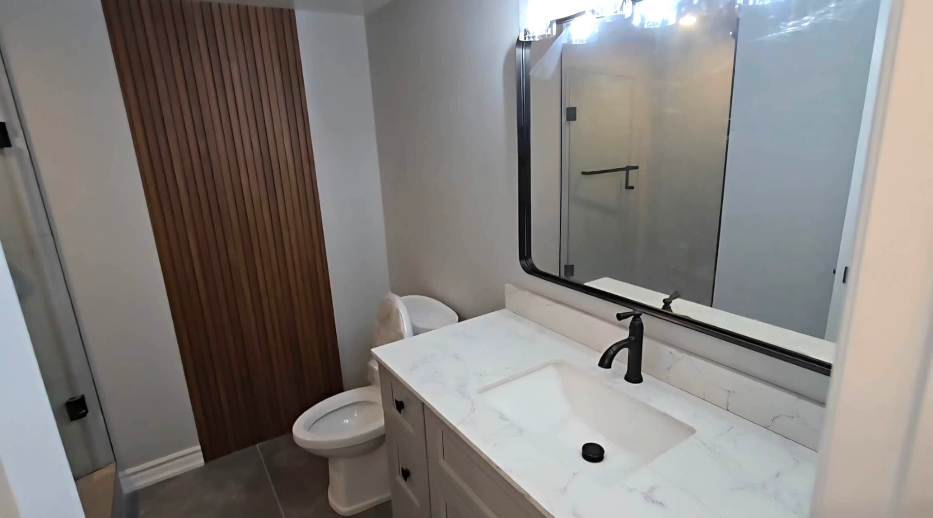 Remodeled bathroom with walk-in shower